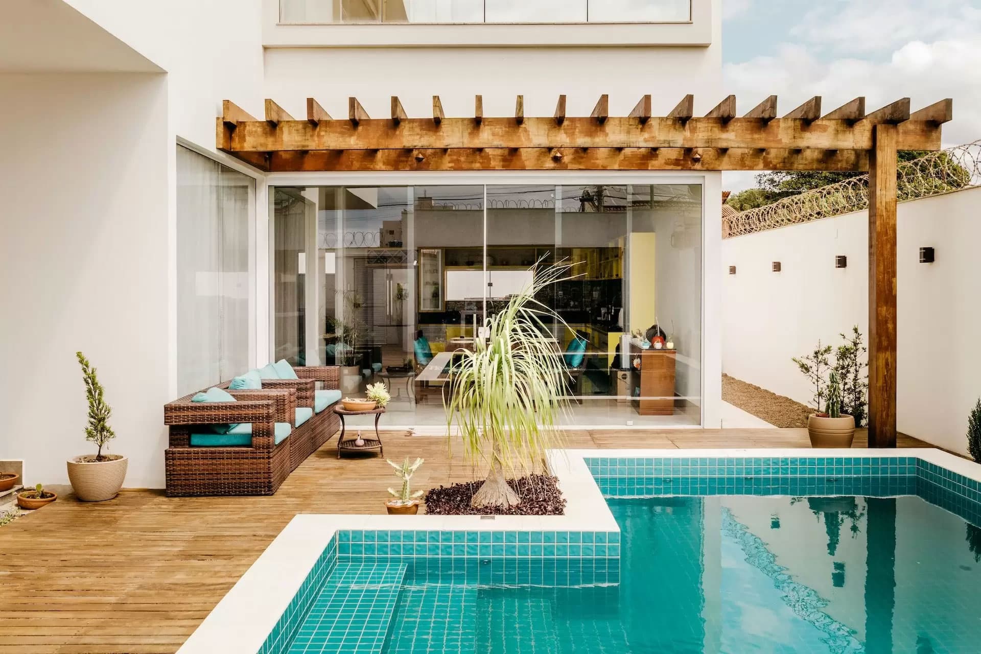 Unveiling the beauty and benefits of poolside pergolas
